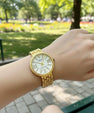 Elegant Gold-Tone Women’s Wristwatch – Crystal Roman Dial & Textured Bracelet Design